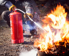 photo of fire extinguisher in use